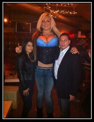 giant blonde woman with blue bra