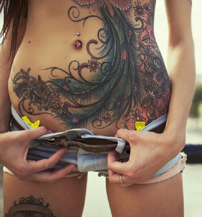 small shorts peacock tattoo girl